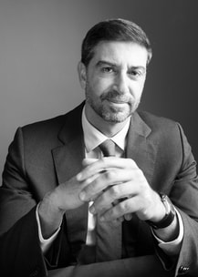 Paulo Zagalo-Melo in a suit, black and white professional photo